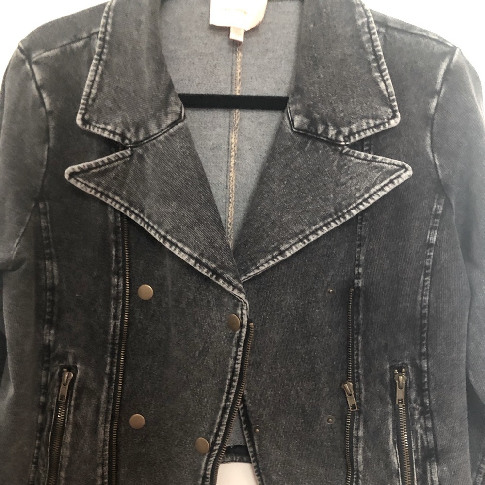 Black moto type Jean jacket.